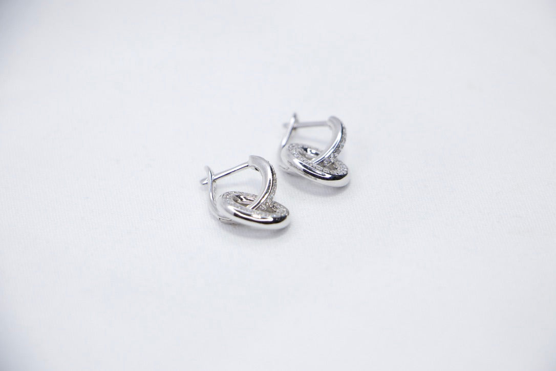 Silver Hoop Earrings with Cubic Zirconia with Minimalist Modern Jewelry for Women top side view.