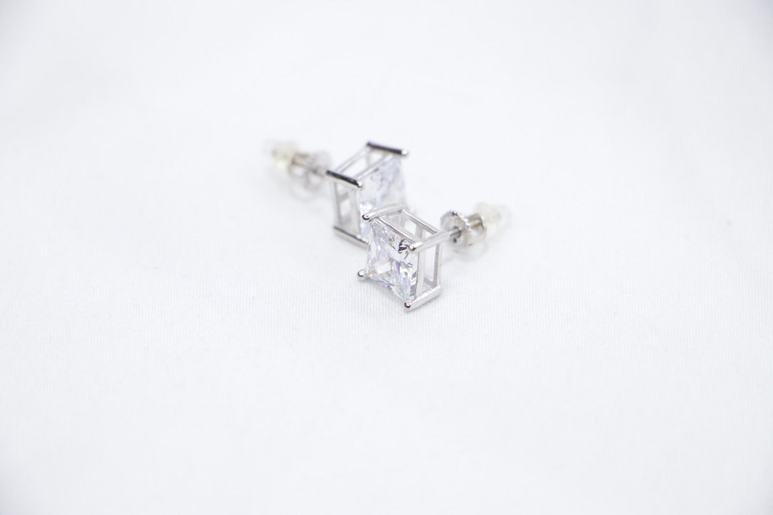 A Modern Sparkle Square Studs featuring square-cut cubic zirconia stones set in sterling silver, front side view.