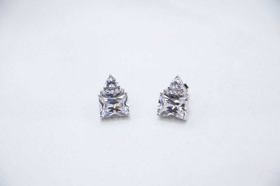 Triple Stone Cubic Zirconia Stud Earrings with Sparkling Statement Jewelry for Women front view.