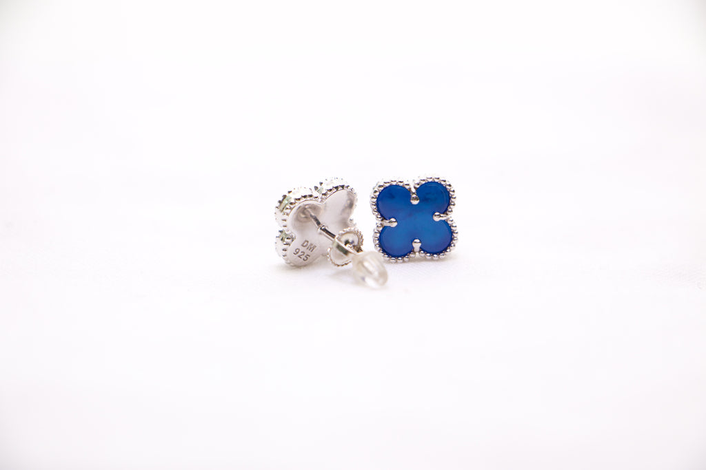 Sterling silver clover earrings with emerald blue enamel, hypoallergenic luxury studs for women.