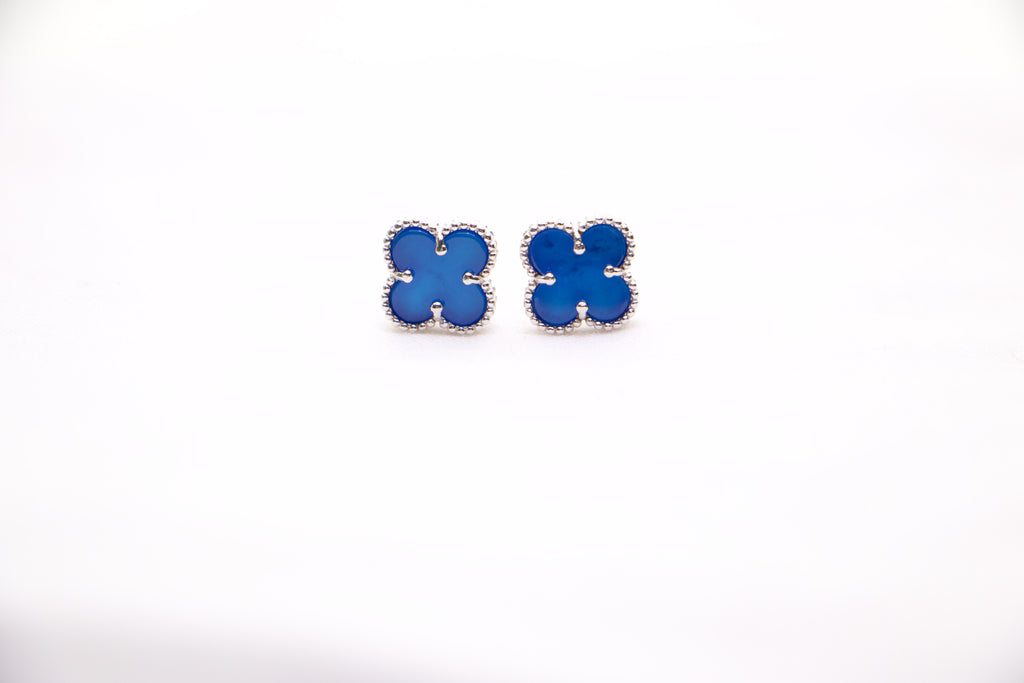 Sterling silver clover earrings with emerald blue enamel, hypoallergenic luxury studs for women.