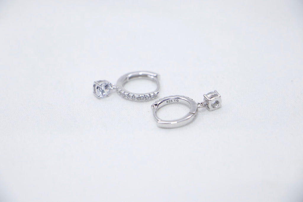 Silver Hoop Earrings with Dangle and Cubic Zirconia - Modern Minimalist Jewelry for Women side views.