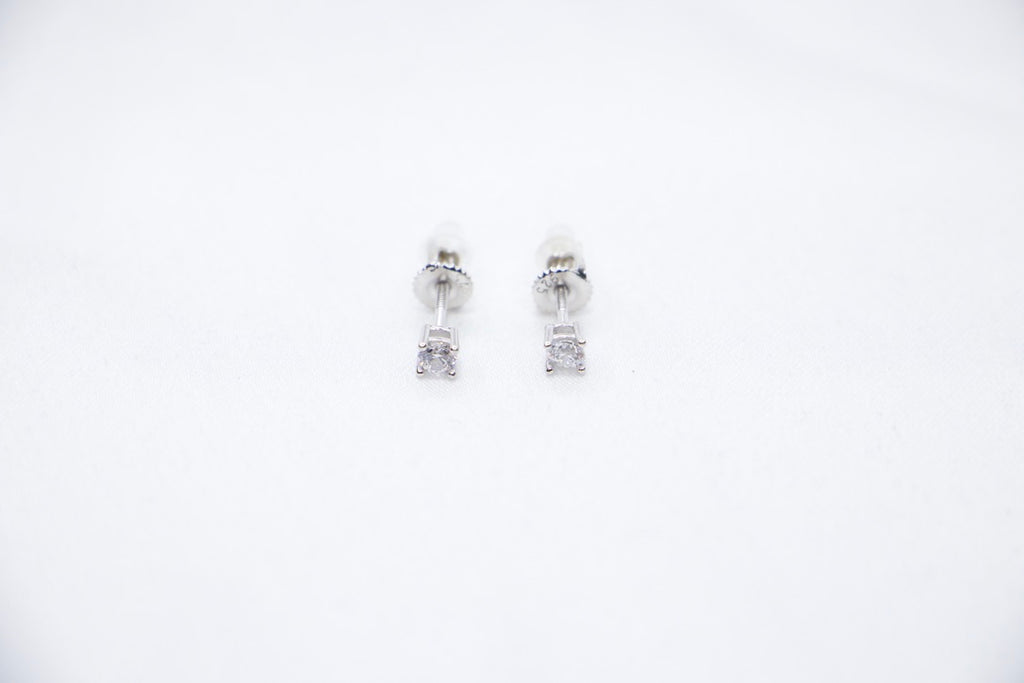  A Classic Radiance Stud Earrings featuring square-cut cubic zirconia stones set in sterling silver, top front view.