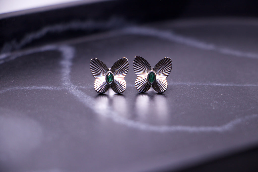 Emerald Accented Butterfly Stud Earrings
