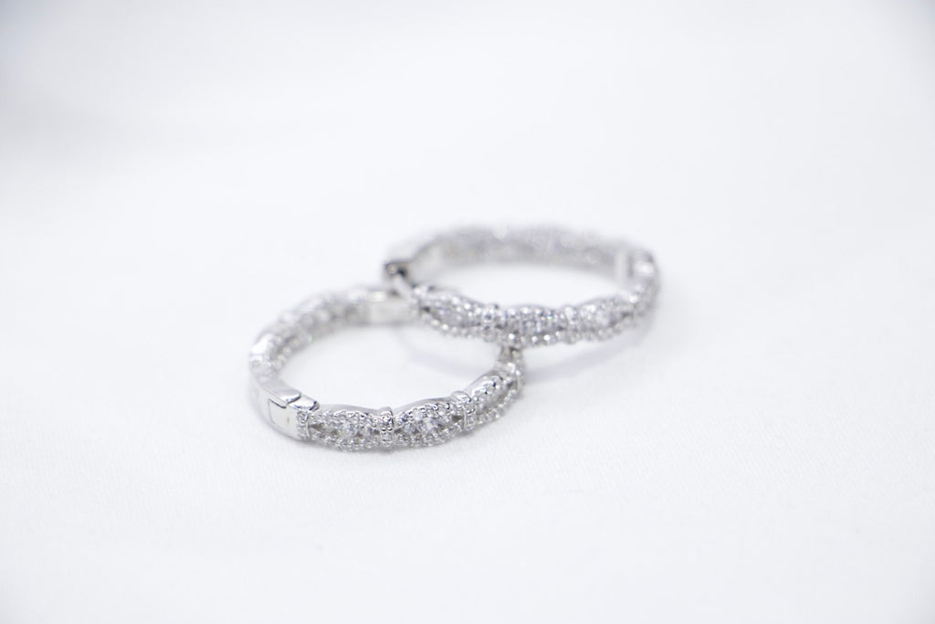 Dazzling Diamond Cut Hoop Earrings - Sparkling Silver Jewelry for Women, side view for Her.