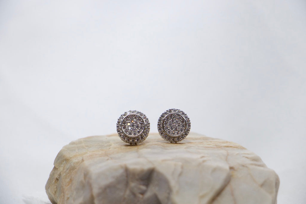 Diamond Halo Stud Earrings - Luxury Diamond Jewelry for Women, front rock view.