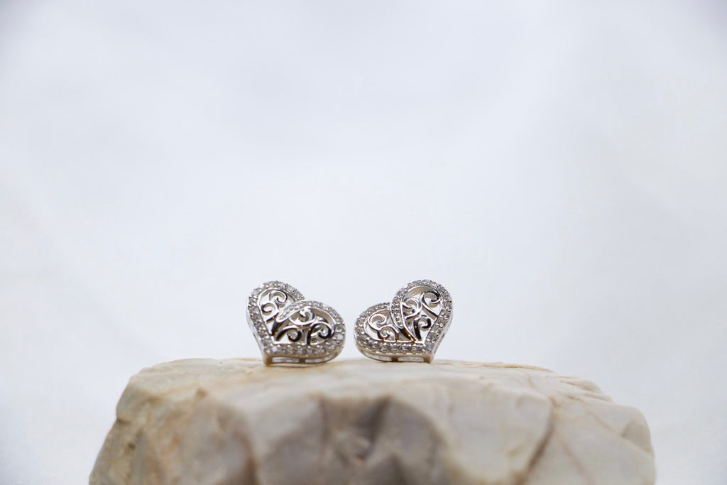 Heart Stud Earrings with Cubic Zirconia, Romantic Jewelry for Women, front rock view.