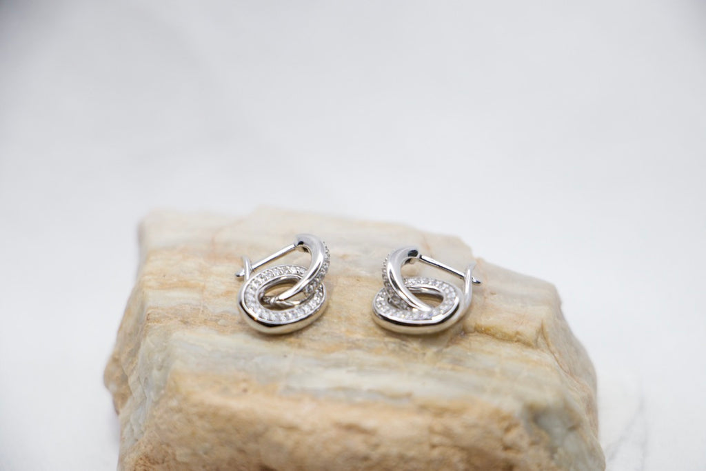 Silver Hoop Earrings with Cubic Zirconia with Minimalist Modern Jewelry for Women with top rock view.