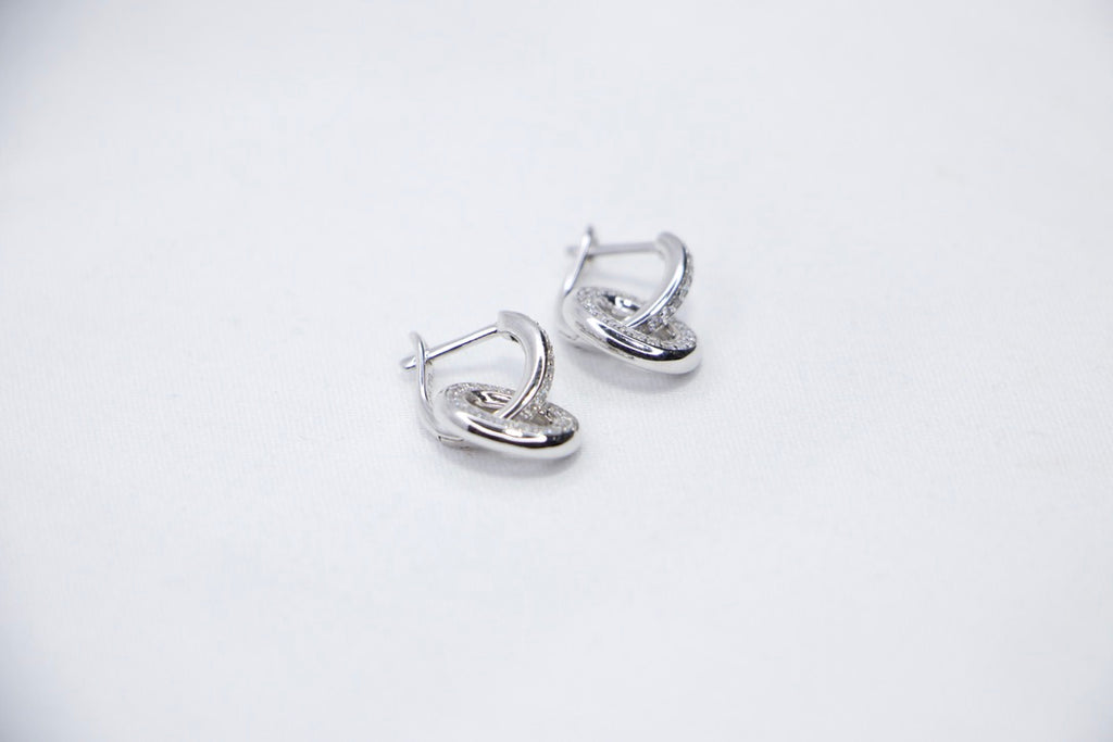 Silver Hoop Earrings with Cubic Zirconia with Minimalist Modern Jewelry for Women top side view.