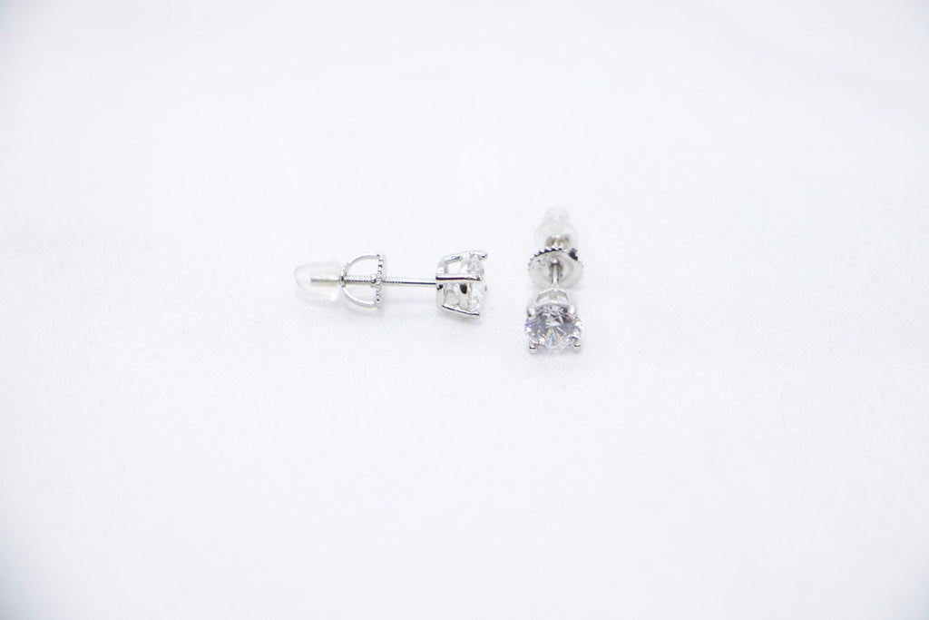 Eternal Glow Stud Earrings featuring square-cut cubic zirconia stones set in sterling silver, a sleek and sparkling design with a secure butterfly-back closure, front side view.