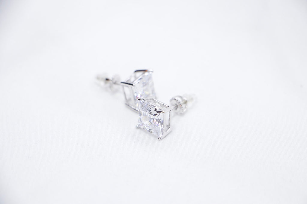 An Eternal Radiance Princess Cut Studs featuring princess-cut cubic zirconia stones set in sterling silver, sides view. 