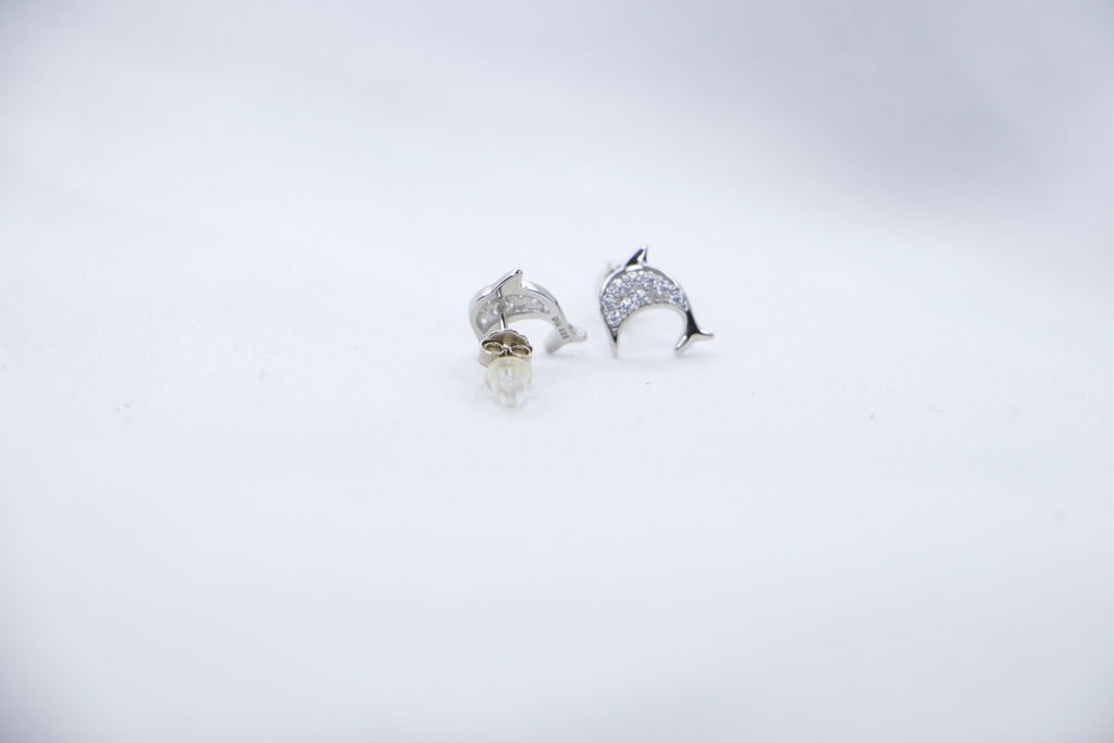 Lunar Dolphin Studs, back view showcasing delicate dolphin design with sparkling details.