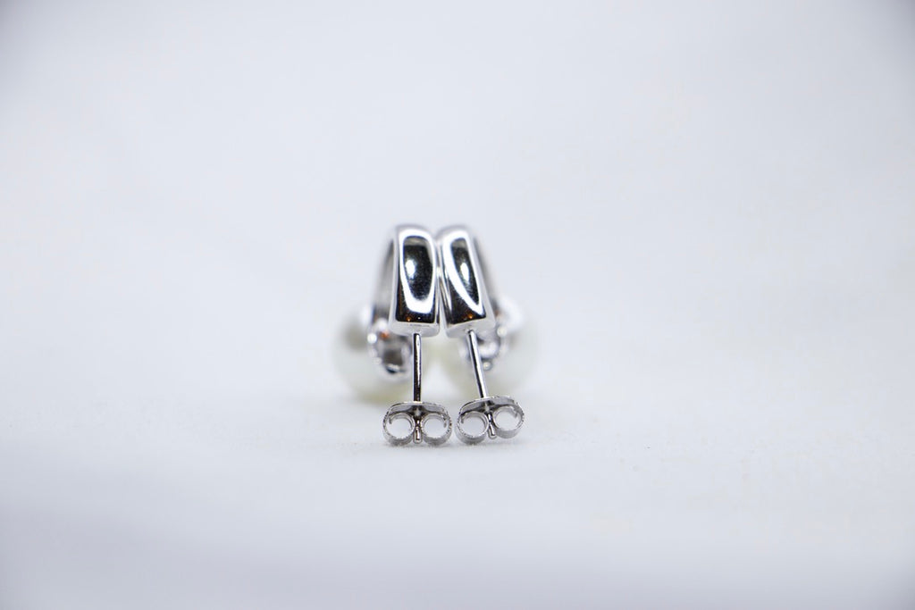Sterling Silver Pearl Hoop Earrings Elegant but Minimalist Jewelry with Lightweight Hoops back view. 