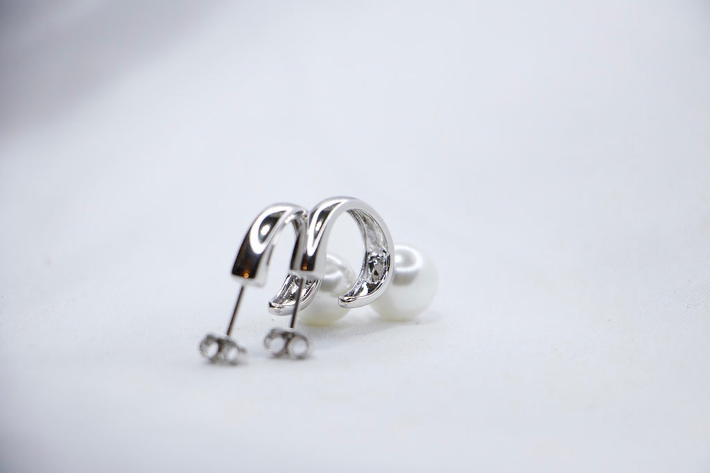 Sterling Silver Pearl Hoop Earrings Elegant but Minimalist Jewelry with Lightweight Hoops side view. 