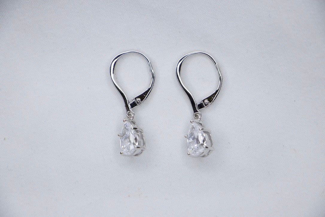 Pear Shaped Dangle Earrings with Cubic Zirconia as Elegant Jewelry for Women, front view.
