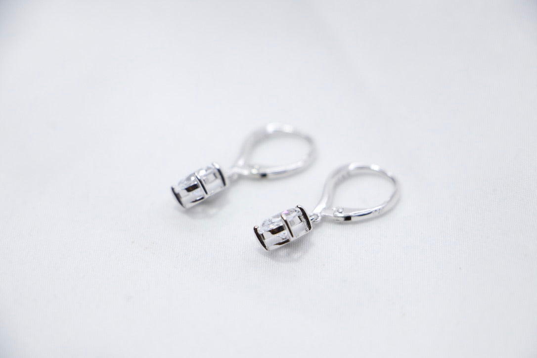 Pear Shaped Dangle Earrings with Cubic Zirconia as Elegant Jewelry for Women, side view.
