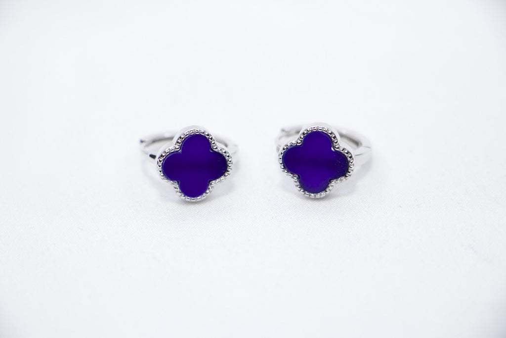 Purple Elegance sterling silver earrings featuring a round purple gemstone surrounded by delicate beaded silver accents front view.