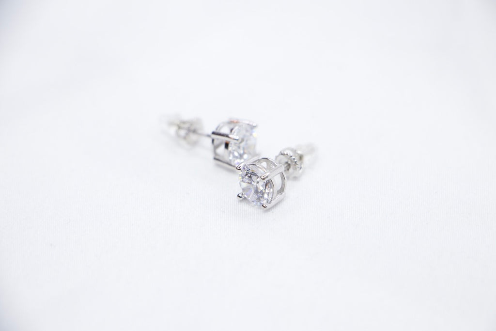 A Radiant Elegance Square Studs featuring a square-cut cubic zirconia set in sterling silver, side view.