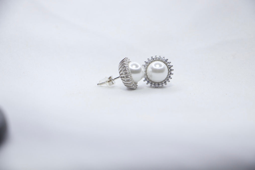 Pearl Stud Earrings with Cubic Zirconia, Enchanted Jewelry for Women, side view.