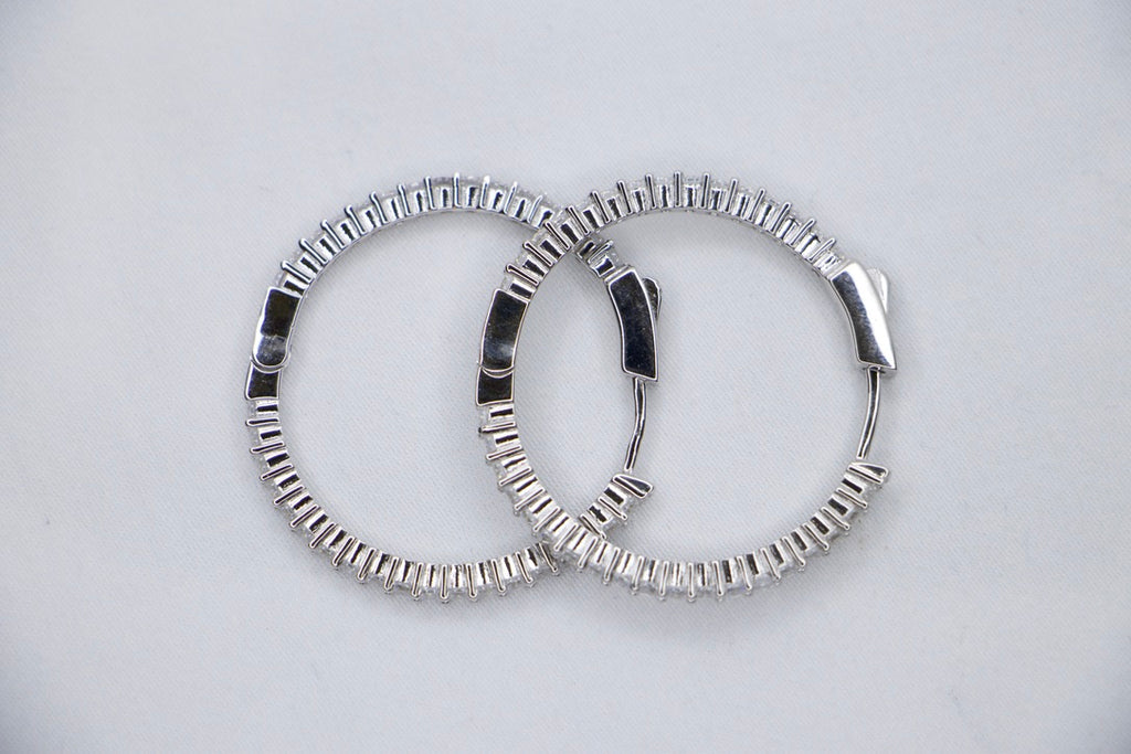 Sparkling Silver Hoop Earrings with Cubic Zirconia - Glamorous Statement Jewelry for Women. 