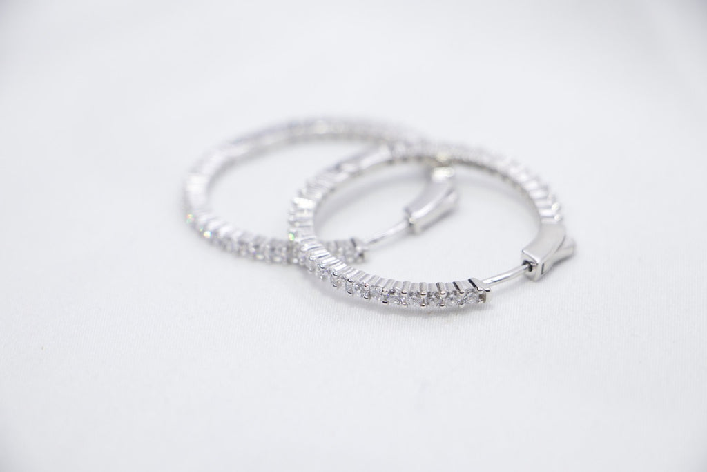 Sparkling Silver Hoop Earrings with Cubic Zirconia - Glamorous Jewelry for Women. 