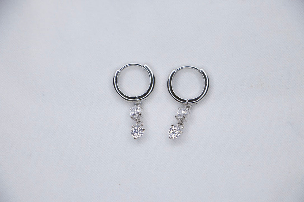 Silver Hoop Earrings with Dangle and Cubic Zirconia with Sparkling Minimalist Jewelry for Women top view.