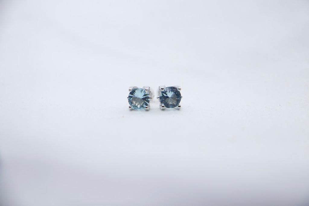 Sky Blue Topaz Halo Stud Earrings with Cubic Zirconia - Blue Gemstone Jewelry, Gift for Her, front view.