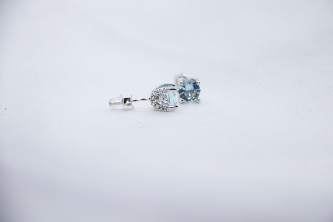 Sky Blue Topaz Halo Stud Earrings with Cubic Zirconia - Blue Gemstone Jewelry, Gift for Her, side view.