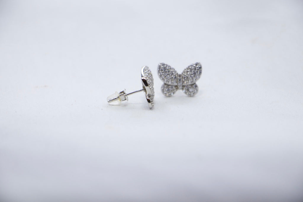 Sparkling Butterfly Stud Earrings in Sterling Silver with Clear Crystals - side view. 