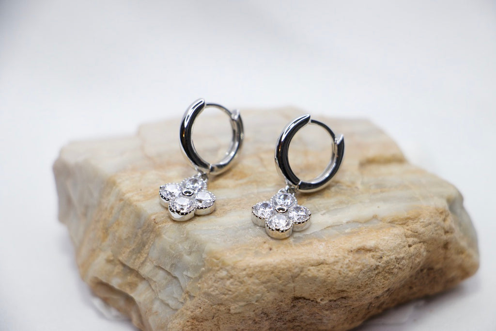 Clover Hoop Earrings with Cubic Zirconia and Good Luck Charm Jewelry for Women, front rock view.
