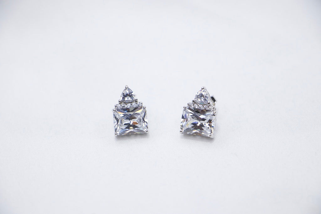 Triple Stone Cubic Zirconia Stud Earrings with Sparkling Statement Jewelry for Women front view.